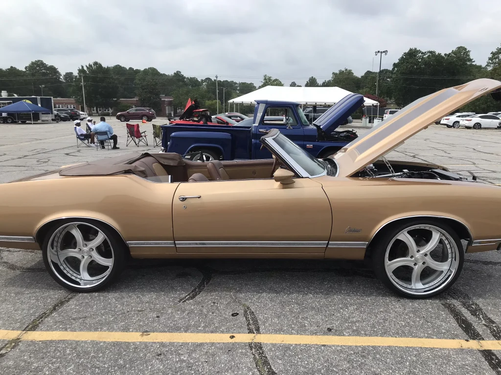 A bronze colored classic car