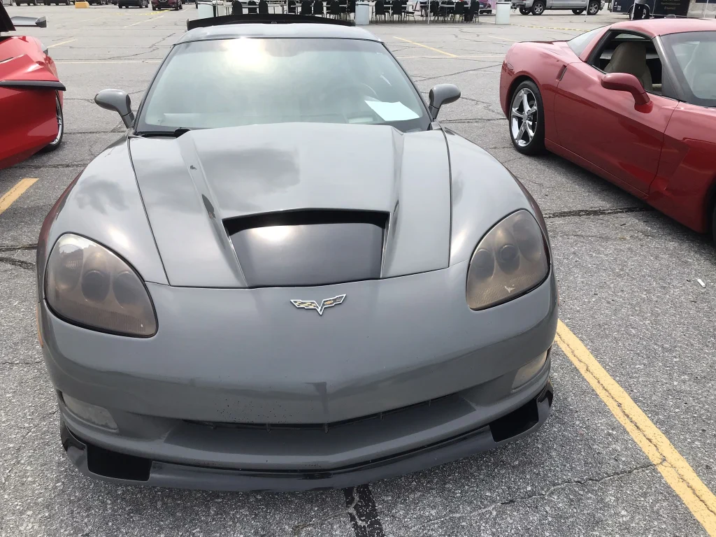 Grey Car At A Car Show