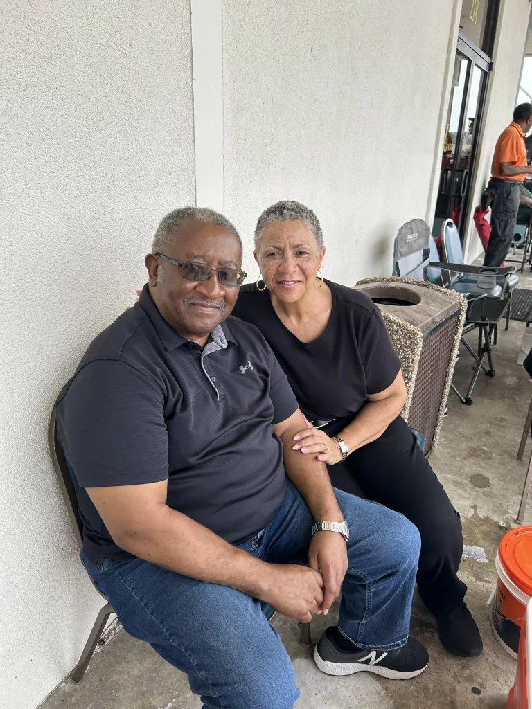 Two attendees of the classic car show